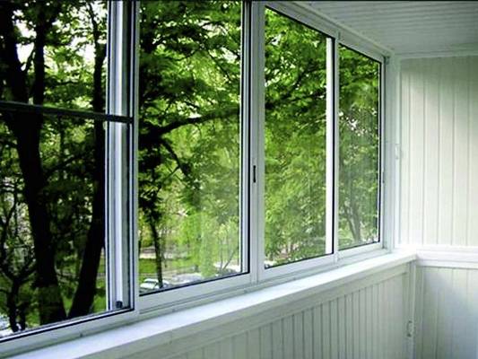 Алюминиевые окна на балкон: 2 основных вида конструкций с фото