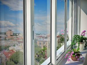 Раздвижные окна для балкона - типы, особенности, характеристики - фото